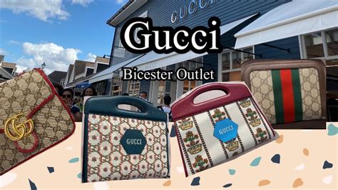 gucci wallet bicester village.